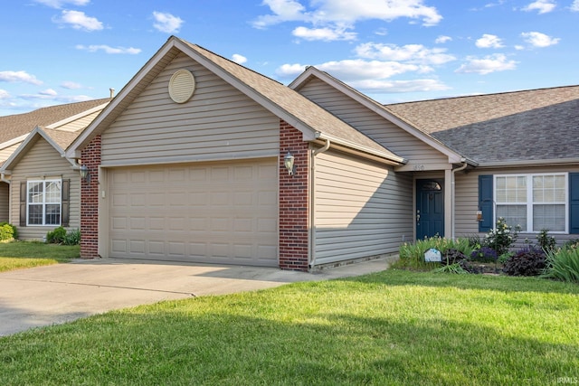 1890 Cal Dr, West Lafayette, IN 47906 - ranch-style home with an attached garage, a shingled roof, concrete driveway, and a front lawn