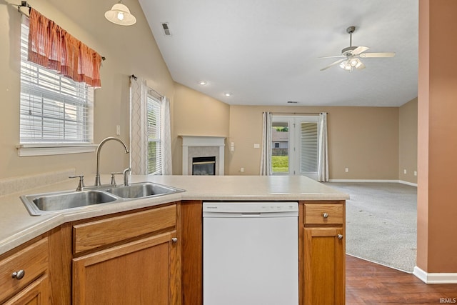 1890 Cal Dr, West Lafayette, IN 47906 - kitchen with dishwasher, open floor plan, a sink, a glass covered fireplace, and a ceiling fan