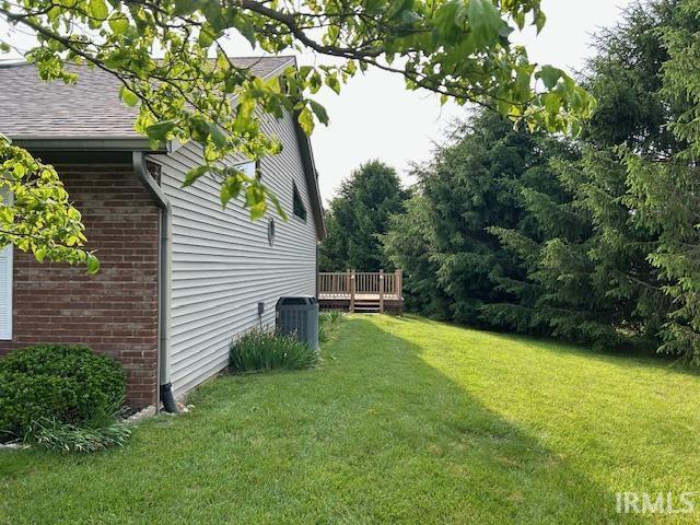 3915 S Allen Ct, Bloomington, IN 47401 - view of grassy yard featuring a deck and cooling unit
