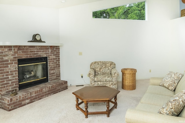 3915 S Allen Ct, Bloomington, IN 47401 - living room featuring carpet flooring and a fireplace