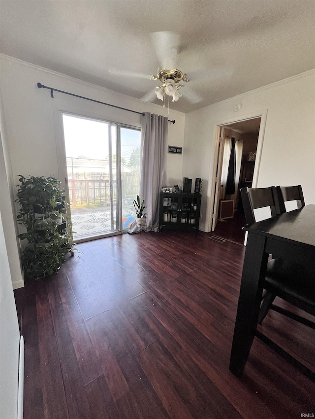 1818 N Indiana Ave, Kokomo, IN 46901 - dining room featuring dark wood-style flooring, ceiling fan, and ornamental molding