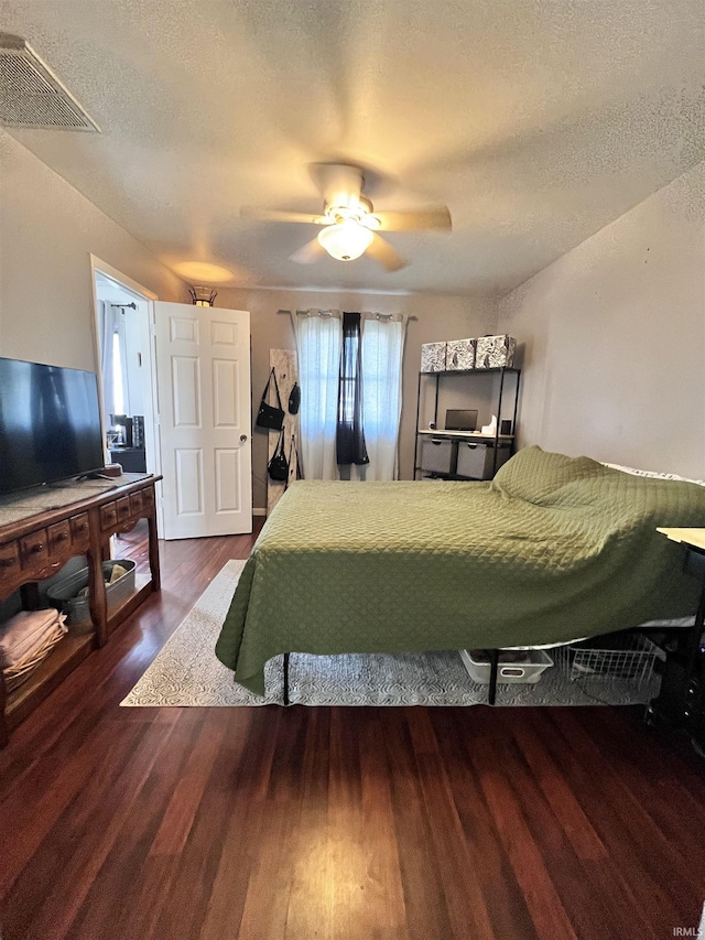 1818 N Indiana Ave, Kokomo, IN 46901 - bedroom with wood finished floors, a textured ceiling, and ceiling fan