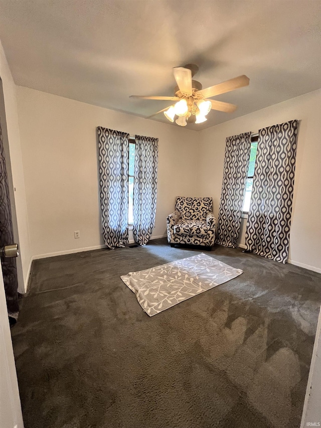 1818 N Indiana Ave, Kokomo, IN 46901 - sitting room with a ceiling fan, carpet flooring, and baseboards