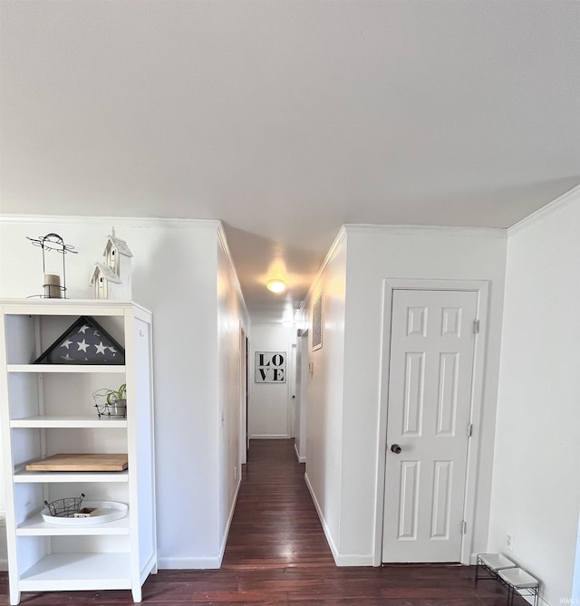 1818 N Indiana Ave, Kokomo, IN 46901 - hallway featuring dark wood finished floors, ornamental molding, and baseboards
