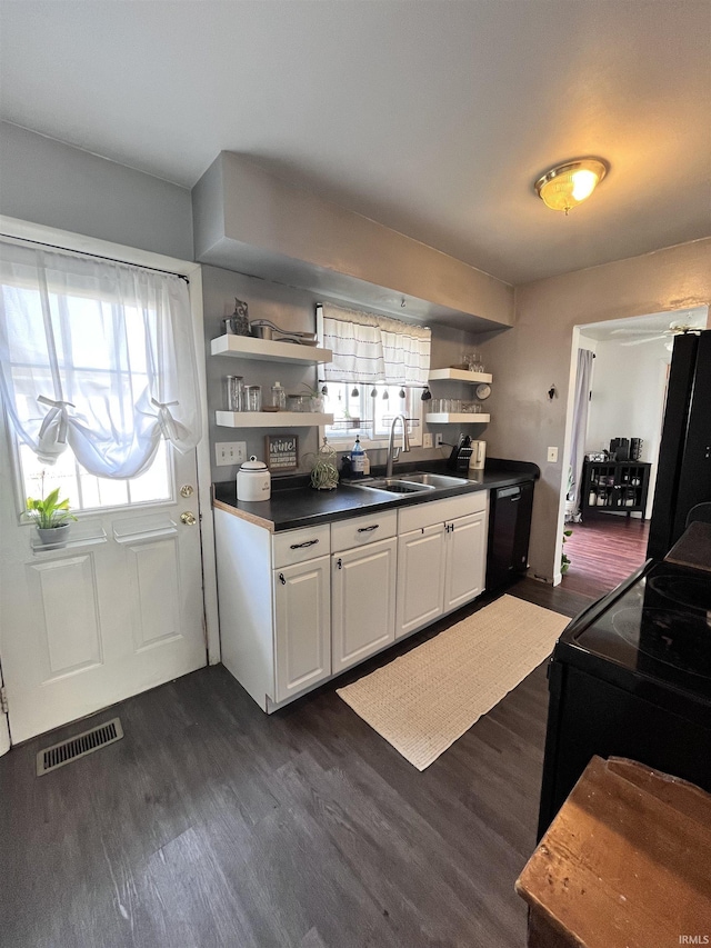 1818 N Indiana Ave, Kokomo, IN 46901 - kitchen with open shelves, a sink, dark wood-style flooring, and dark countertops