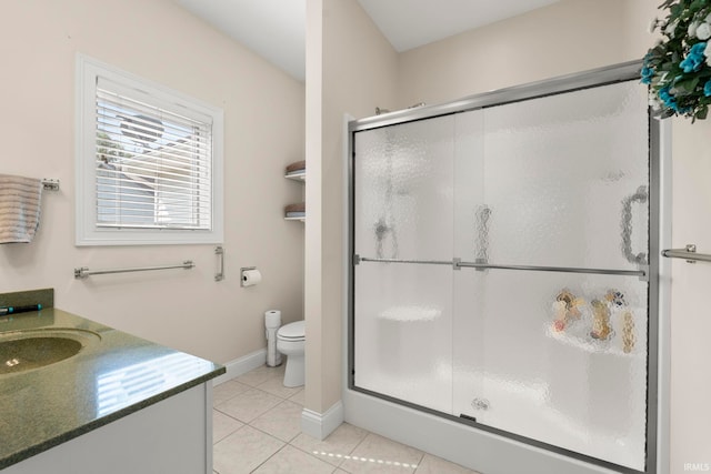 2410 Deerfield Ct, Decatur, IN 46733 - full bath featuring a stall shower, tile patterned floors, toilet, and vanity