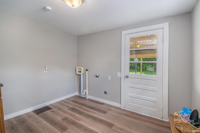 773 N E St, Wabash, IN 46992 - laundry room with electric dryer hookup, wood finished floors, baseboards, and washer hookup