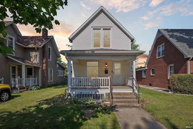 819 S 8th St, Goshen, IN 46526 - view of front facade featuring a porch and a lawn