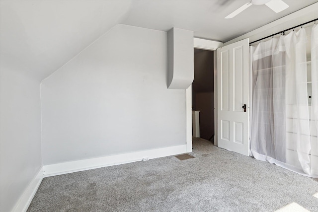 819 S 8th St, Goshen, IN 46526 - bonus room with carpet floors, lofted ceiling, a ceiling fan, and baseboards