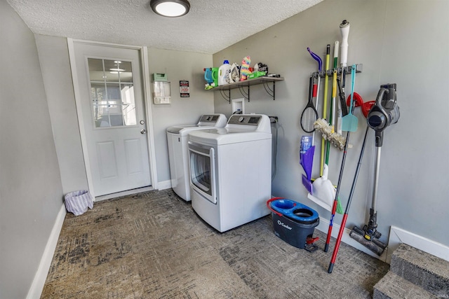 104 N Jefferson St, Pine Village, IN 47975 - laundry room featuring washer and dryer, a textured ceiling, and baseboards