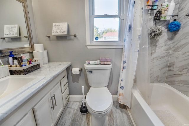 104 N Jefferson St, Pine Village, IN 47975 - full bathroom featuring vanity, toilet, baseboards, wood finished floors, and shower / tub combo