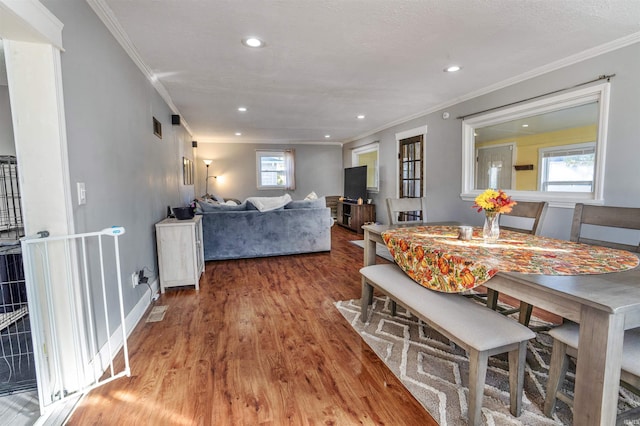 104 N Jefferson St, Pine Village, IN 47975 - dining area featuring crown molding, wood finished floors, recessed lighting, and baseboards