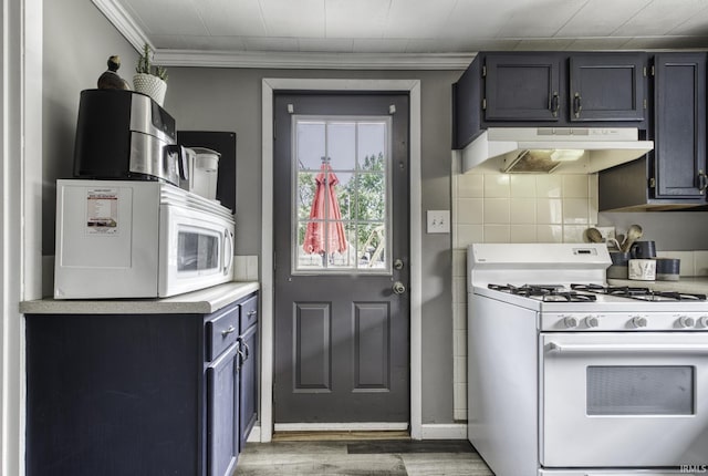 1439 W Central Ave, Bluffton, IN 46714 - kitchen featuring white appliances, under cabinet range hood, light wood finished floors, light countertops, and crown molding