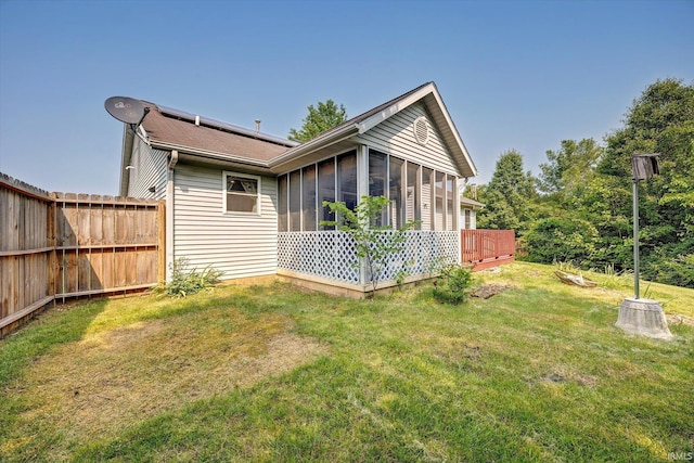 1063 S Colchester Ct, Bloomington, IN 47401 - rear view of property with a sunroom