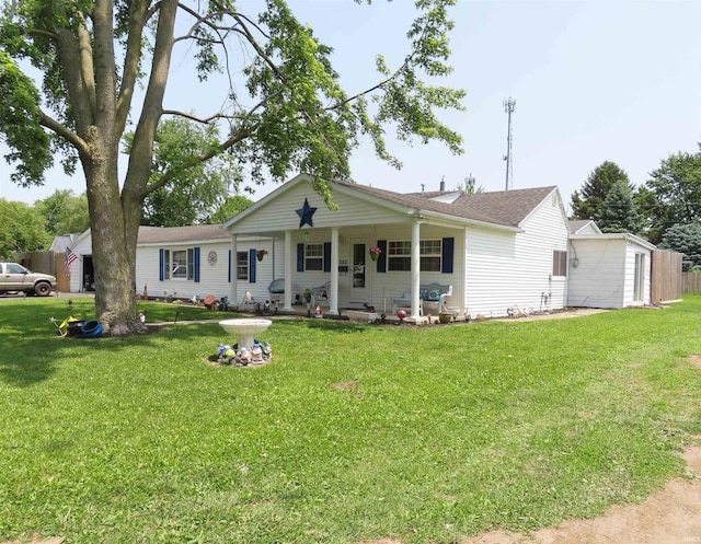 303 S Lenfesty Ave, Marion, IN 46952 - view of front facade featuring a front lawn and a shingled roof