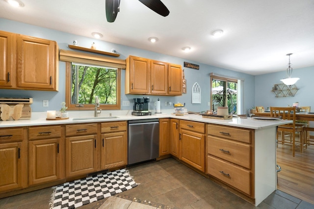 2796 N 85 W, Angola, IN 46703 - kitchen featuring dishwasher, a sink, a peninsula, light countertops, and a ceiling fan