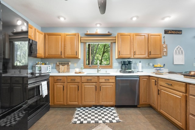2796 N 85 W, Angola, IN 46703 - kitchen with stainless steel appliances, a sink, and light countertops