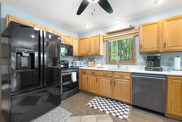 2796 N 85 W, Angola, IN 46703 - kitchen featuring black appliances, a sink, ceiling fan, and light countertops