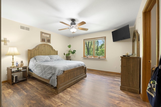 2796 N 85 W, Angola, IN 46703 - bedroom featuring wood finished floors, baseboards, and a ceiling fan