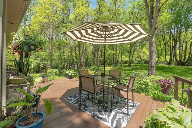 2796 N 85 W, Angola, IN 46703 - wooden terrace with outdoor dining area, a yard, and view of wooded area