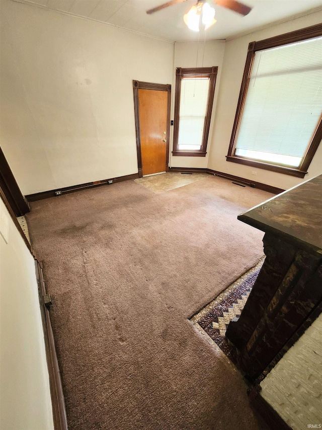 708 Columbia Ave, Fort Wayne, IN 46805 - carpeted spare room with ceiling fan and baseboards