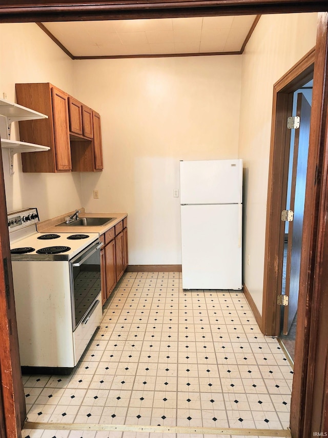 708 Columbia Ave, Fort Wayne, IN 46805 - kitchen featuring white appliances, crown molding, brown cabinetry, vaulted ceiling, and baseboards