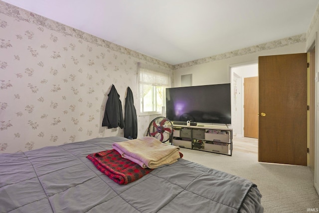 1210 Mcintyre Dr, Auburn, IN 46706 - bedroom with wallpapered walls and carpet floors