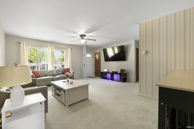 1210 Mcintyre Dr, Auburn, IN 46706 - living area featuring light colored carpet and a ceiling fan