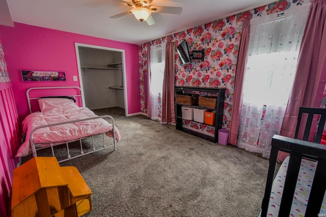 407 S Colony Dr, Garrett, IN 46738 - bedroom with carpet floors, wallpapered walls, a closet, and a ceiling fan