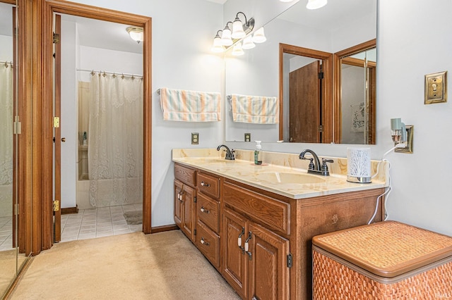 2027 Deer Trl, Warsaw, IN 46580 - bathroom featuring double vanity, tile patterned flooring, a shower with shower curtain, and baseboards