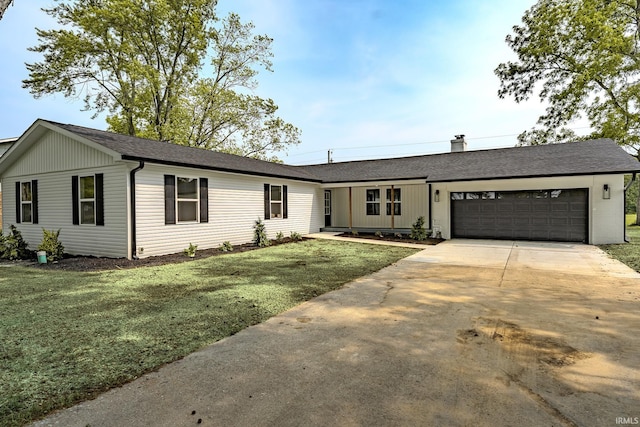 2135 Old Oak Dr, West Lafayette, IN 47906 - single story home featuring an attached garage, concrete driveway, roof with shingles, and a front yard