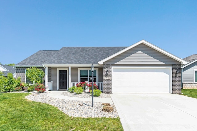15926 Continental Dr, Huntertown, IN 46748 - ranch-style house with brick siding, an attached garage, and covered porch