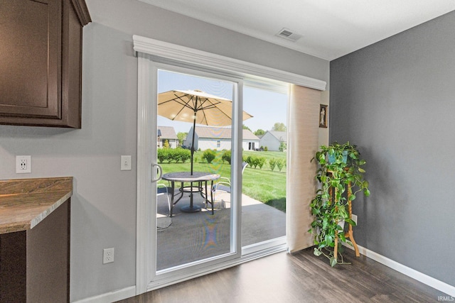 15926 Continental Dr, Huntertown, IN 46748 - entryway featuring baseboards and dark wood-style flooring