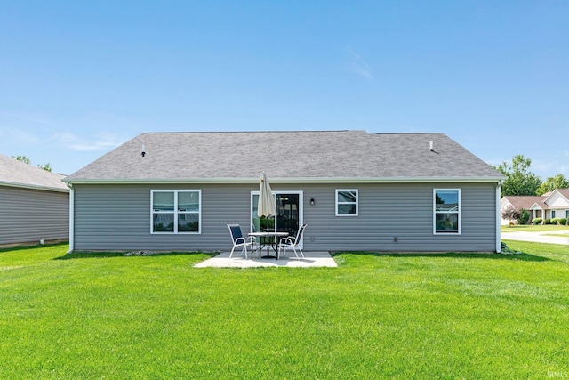 15926 Continental Dr, Huntertown, IN 46748 - back of house featuring a patio area and a lawn