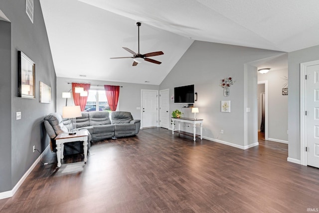 15926 Continental Dr, Huntertown, IN 46748 - living area with ceiling fan, high vaulted ceiling, dark wood-style flooring, and baseboards