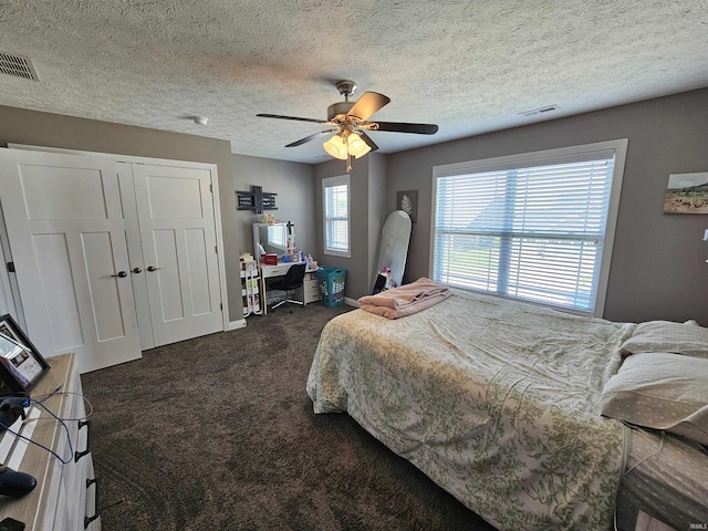 2659 Sea Biscuit Ln, Kokomo, IN 46901 - bedroom with carpet floors, ceiling fan, and a textured ceiling