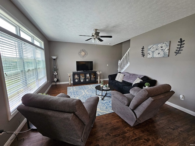 2659 Sea Biscuit Ln, Kokomo, IN 46901 - living area with ceiling fan, baseboards, wood finished floors, a textured ceiling, and stairway