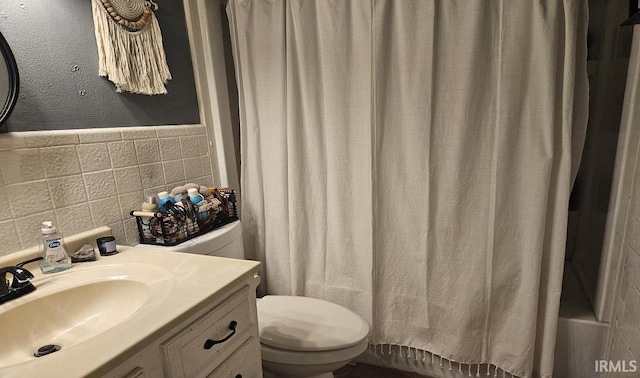 1104 Alder Dr, Lafayette, IN 47909 - bathroom featuring tile walls, toilet, shower / bath combo, and vanity