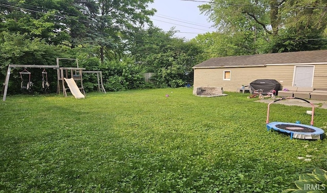 1104 Alder Dr, Lafayette, IN 47909 - view of yard featuring a playground and a fire pit