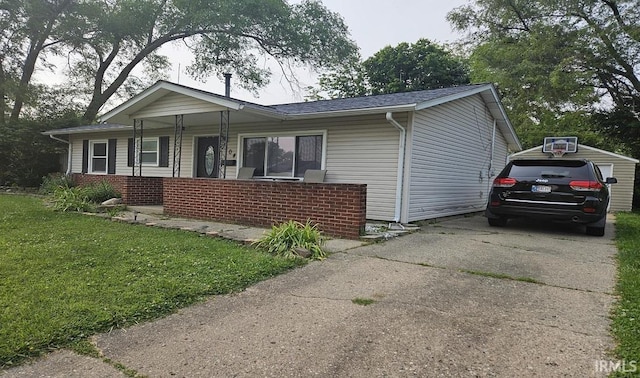 1104 Alder Dr, Lafayette, IN 47909 - single story home featuring driveway, a front yard, a porch, and a garage