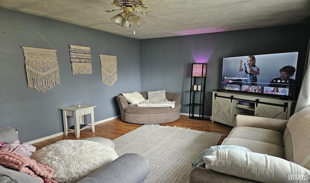 1104 Alder Dr, Lafayette, IN 47909 - living room with ceiling fan, wood finished floors, and baseboards
