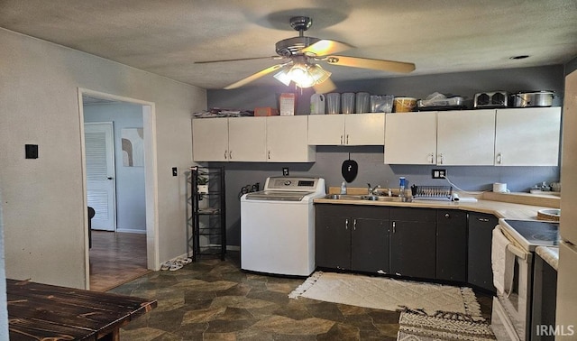 1104 Alder Dr, Lafayette, IN 47909 - kitchen with washer / clothes dryer, electric stove, a ceiling fan, a sink, and white cabinets