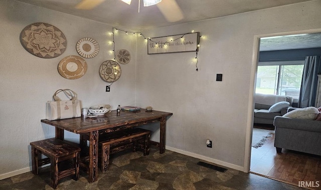 1104 Alder Dr, Lafayette, IN 47909 - dining room featuring ceiling fan and baseboards
