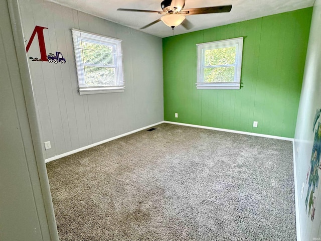 42 Center St, Avoca, IN 47420 - empty room featuring ceiling fan, carpet flooring, and baseboards