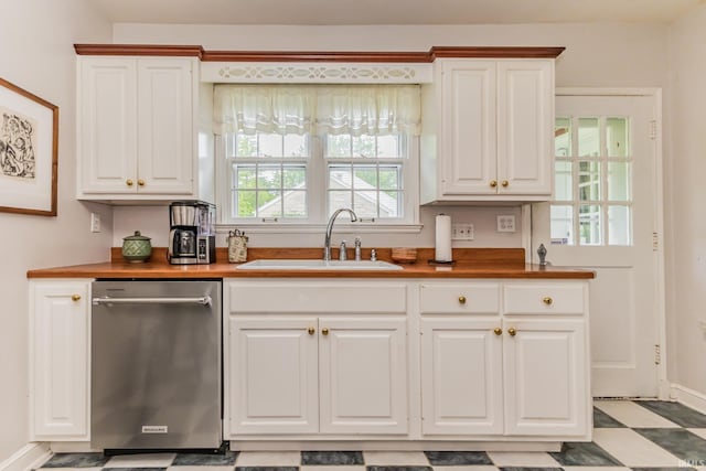 308 N Forest Ave, Muncie, IN 47304 - kitchen with a sink, dishwasher, white cabinets, and butcher block counters