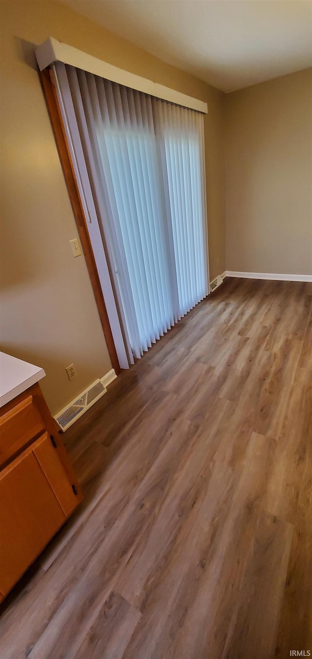 1609 Gordon Dr, Kokomo, IN 46902 - unfurnished room with baseboards and wood finished floors