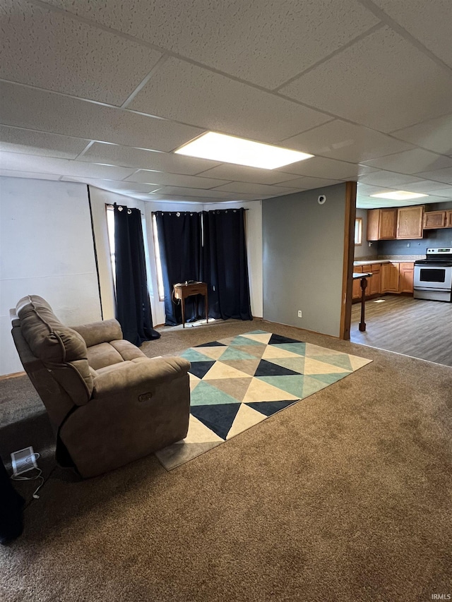 443 S State St, Sullivan, IN 47882 - living room featuring light carpet and a drop ceiling