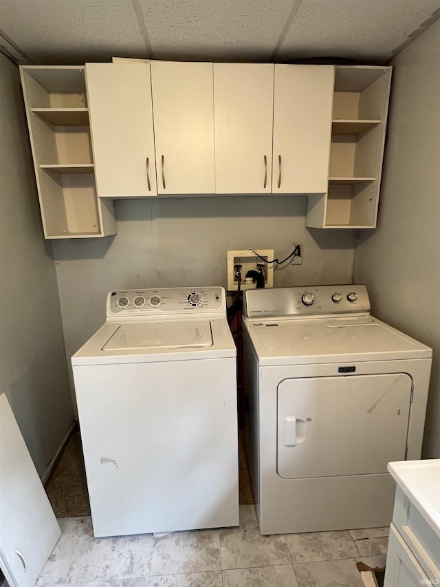 443 S State St, Sullivan, IN 47882 - laundry room featuring independent washer and dryer and cabinet space
