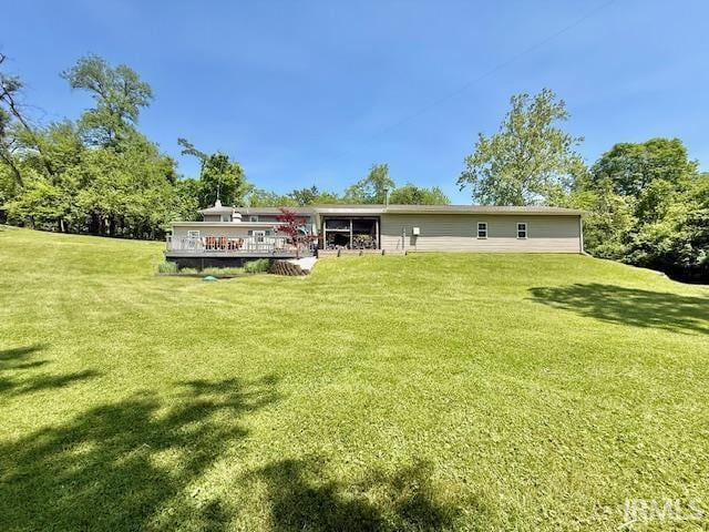 981 Keyser Ln, Richmond, IN 47374 - back of house featuring a yard and a wooden deck