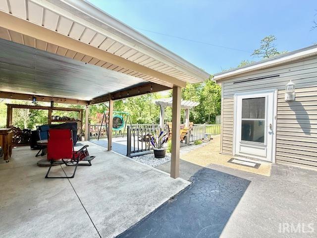 981 Keyser Ln, Richmond, IN 47374 - view of patio with a playground